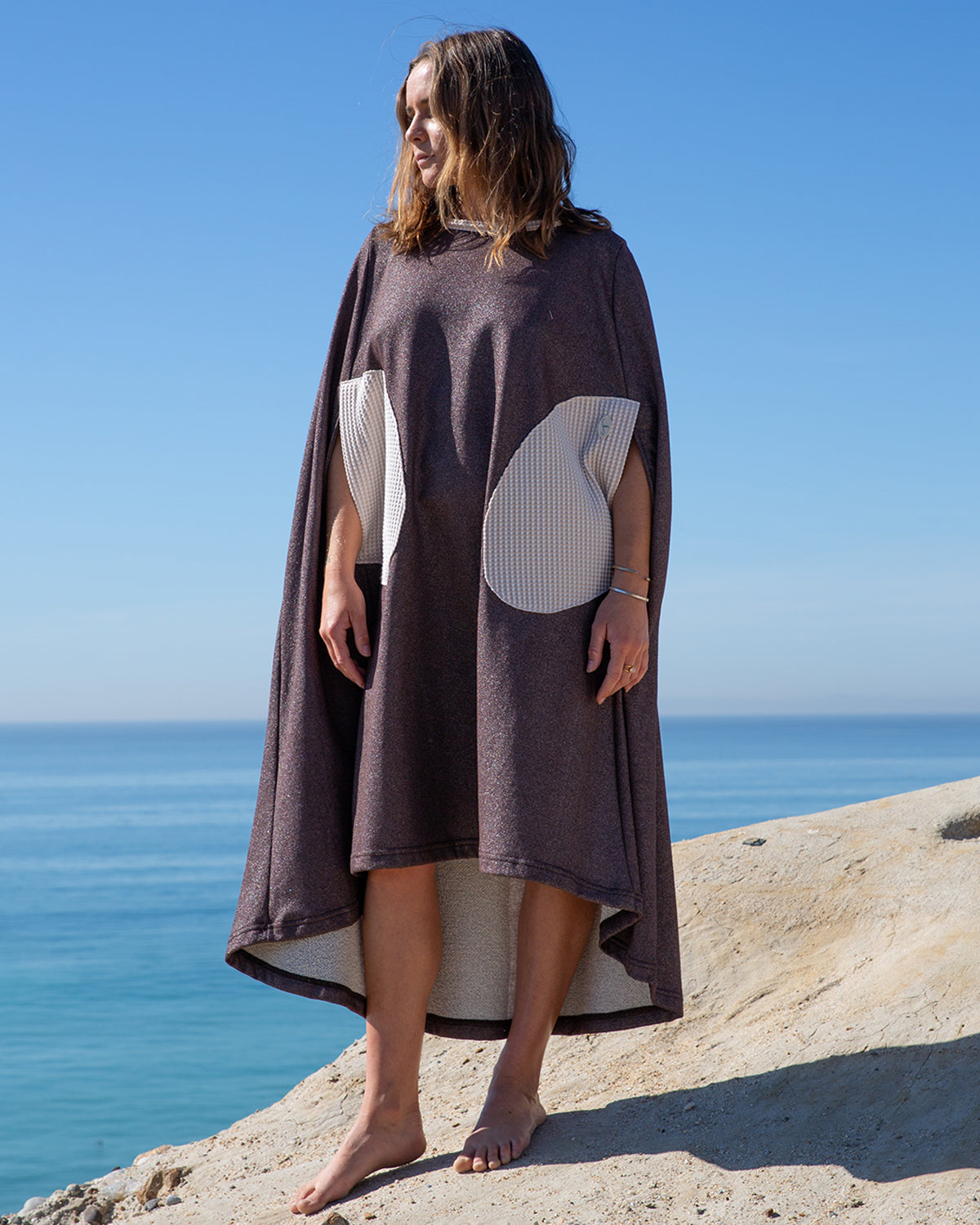 brown Changing cape shoreline seea beachwear clothing surf clothes