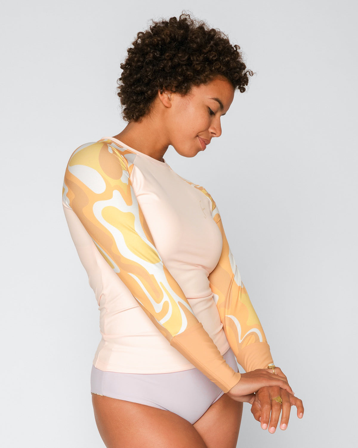 Doheny Solaris Peach Yellow Swirl Pattern Rashguard Long Sleeve Sun Protection
